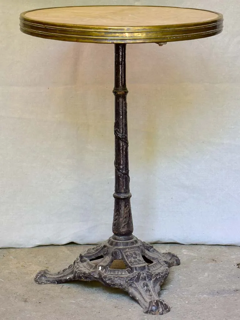 Early 20th-century bistro table with marble top and cast iron base