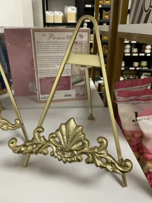 gold ornate easel