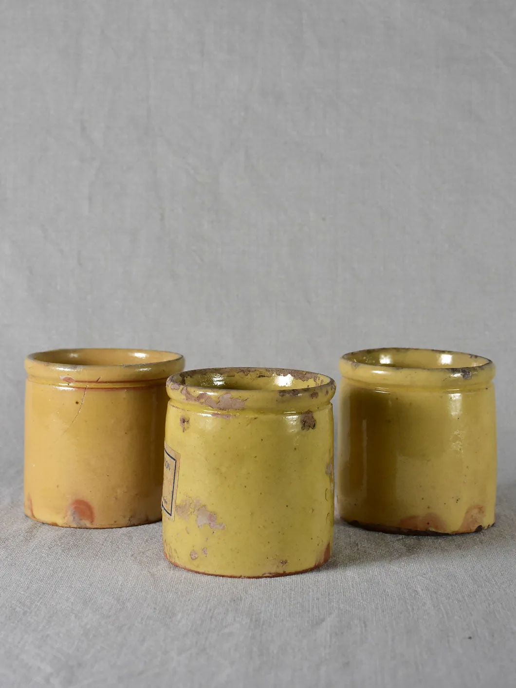 Three antique French yellow ware preserving jars 4"