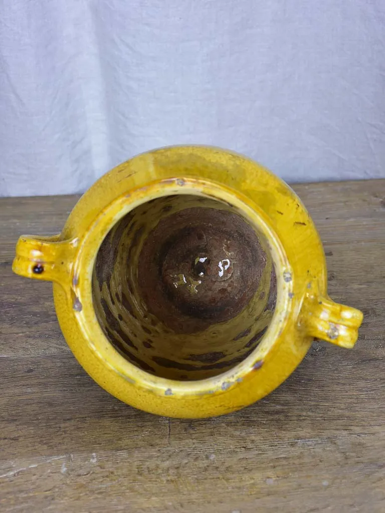 Timeworn antique French confit pot with yellow glaze 10¾"