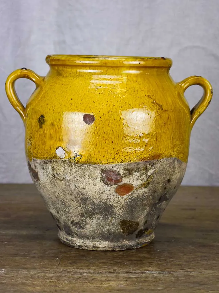 Timeworn antique French confit pot with yellow glaze 10¾"